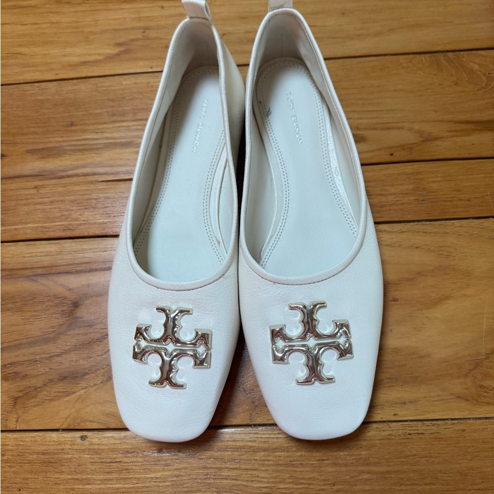 Tory Burch Ivory Flats with Metallic Emblem